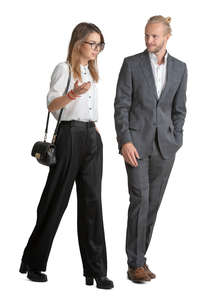 businessman and woman walking and talking