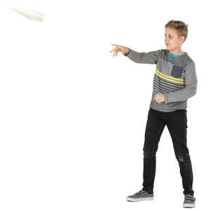 boy flying a paper plane