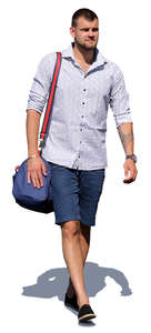 man with a sports bag walking