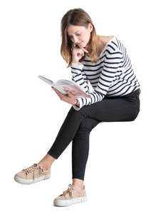 young woman sitting and reading