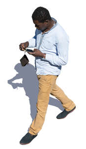 black man walking seen from above