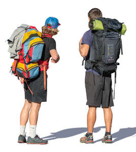 two men with hiking backpacks standing