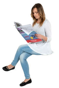 woman sitting and reading a newspaper