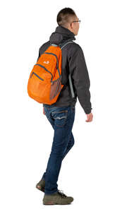 asian man with a backpack walking