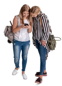 two women looking at a phone seen from above