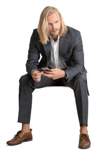 man in a suit sitting