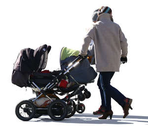 two women with baby carriages walking