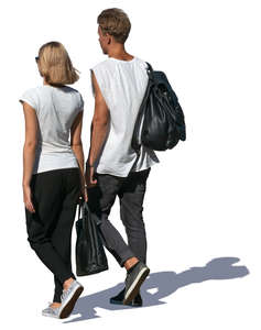 man and woman walking on a sunny day