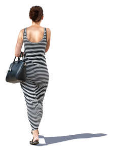 woman in a striped summer dress walking