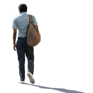 backlit black man with a backpack walking