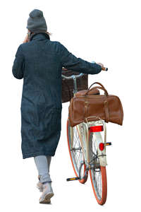 woman pushing a bicycle 