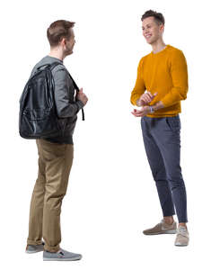 two young men standing and talking