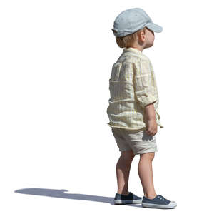 little boy with a baseball cap standing