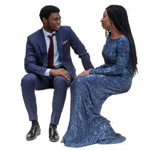 black woman and man sitting on a formal event