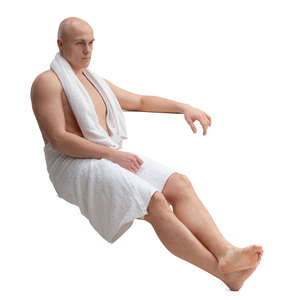 man sitting in the sauna