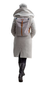woman in a grey overcoat walking