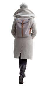 woman in a grey overcoat walking