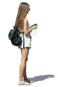 young long haired woman standing on a summer day