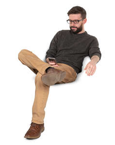 man sitting and texting