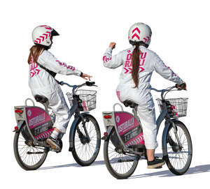 two women in uniform costumes cycling