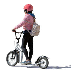girl with a pink helmet riding a scooter