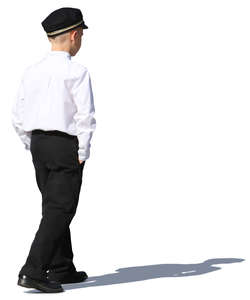 boy in a school uniform walking