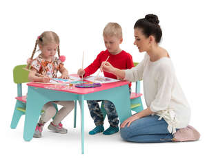 children painting at childrens play table