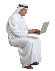 arab man sitting and working with computer