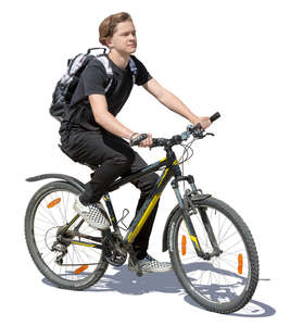 teenage boy riding a bike