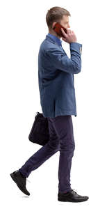 man walking and talking on the phone