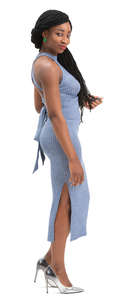 black woman in a blue dress standing
