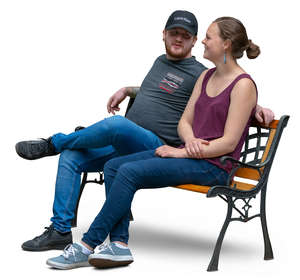 couple sitting on a bench and talking