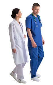 two medical workers walking and talking