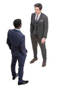 two men in suits talking seen from above