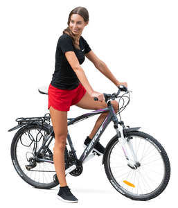 smiling woman riding a bike