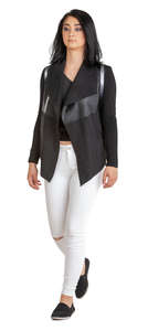 woman in a black and white outfit walking