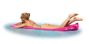 woman lying on the pool mattress