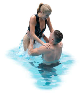 man and woman having fun in the pool