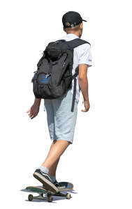 teenage boy riding a skateboard