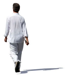 man in a white outfit walking