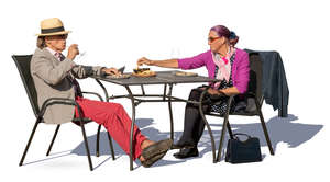 older couple sitting in a cafe