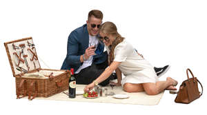 man and woman having a fancy picnic