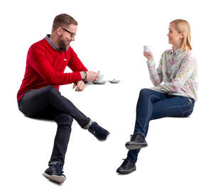 man and woman drinking coffee and talking