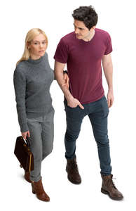 man and woman walking arm in arm seen from above