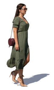 woman in a green dress walking