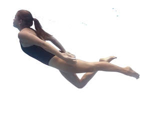 woman swimming under water