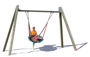 woman and child playing on a playground