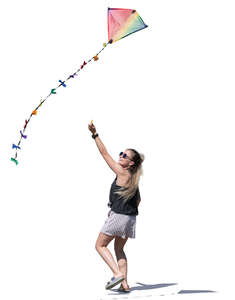 young woman flying a kite