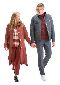 young couple walking happily hand in hand