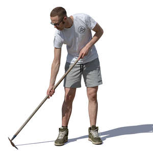 man raking on a sunny day